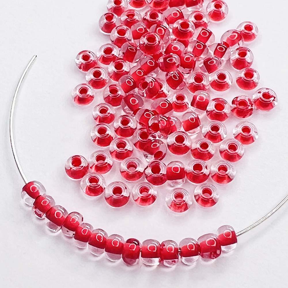 Red Lined Crystal 6/0 Czech Seed Bead