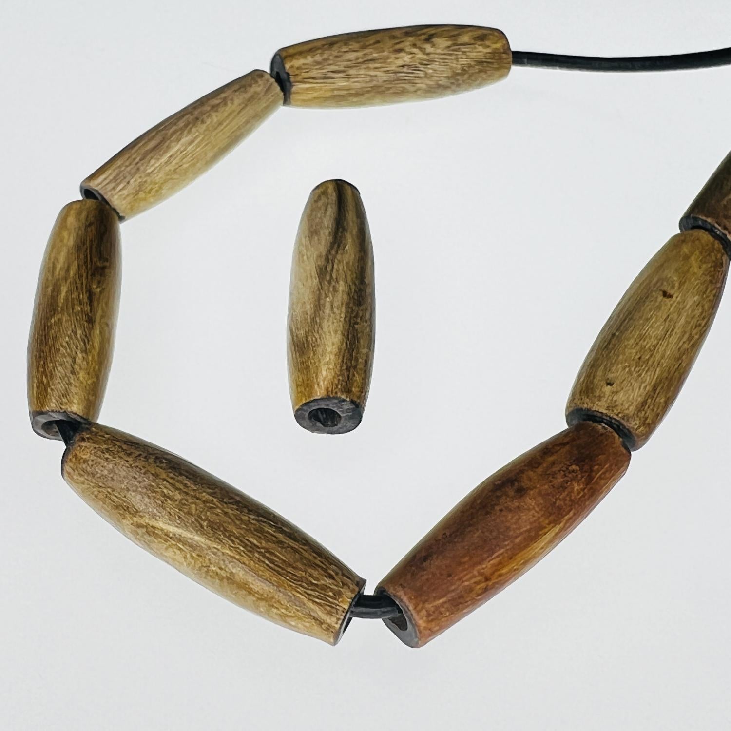 1 Inch Olive Horn Hairpipe Bead