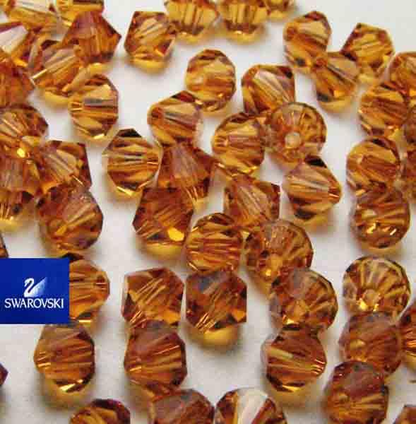 Topaz 4MM Swarovski Bicone