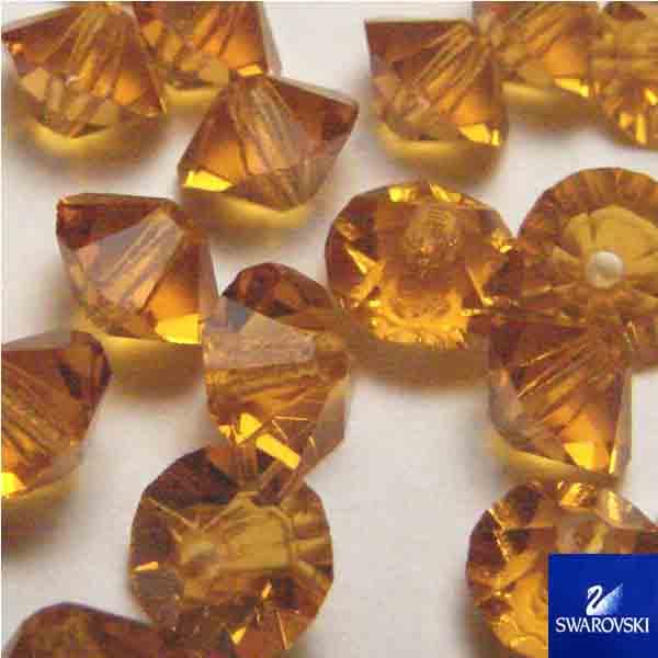 Topaz 6X4MM Cut Swarovski Flat Bicone Art. 5305