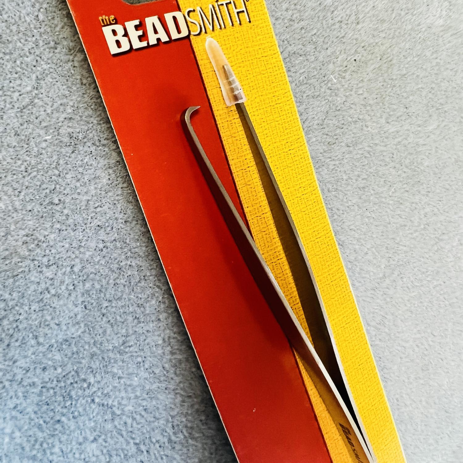 Tweezers for Opening Split Rings
