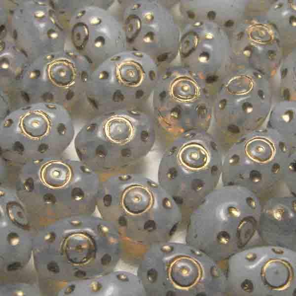 White Opal 9X6MM Oval With Gold Dots And Eye Detail