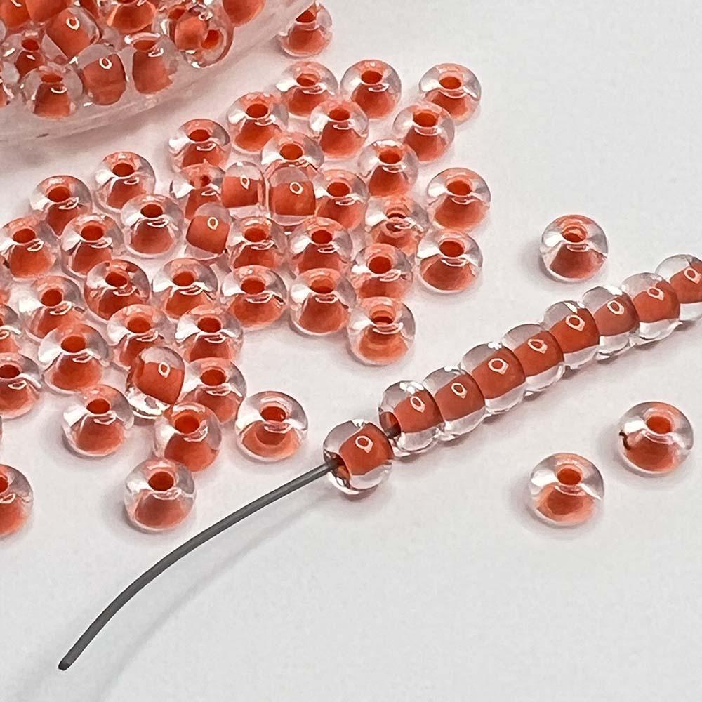 Orange Lined Crystal 6/0 Czech Seed Bead